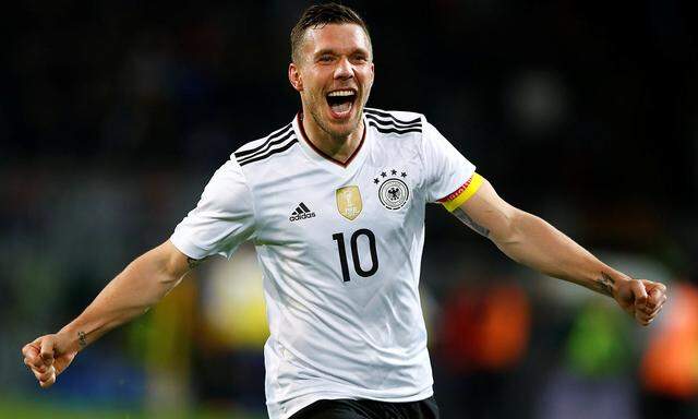 Germany's Lukas Podolski celebrates scoring againsr England