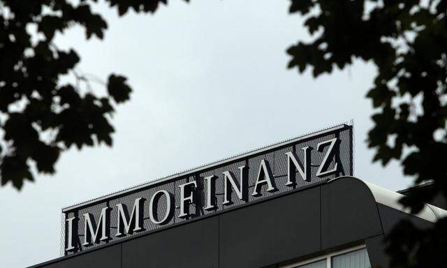FILE PHOTO: The logo of Austrian real estate group Immofinanz is pictured on top of the company's headquarters building in Vienna