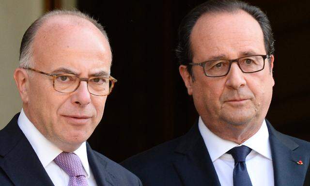 Der bisherige Innenminister Cazeneuve (l.) gilt als einer der populärsten Politiker der Regierung Hollande (r.). 