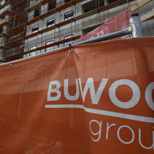 File photo of the logo of Austrian real estate agent BUWOG seen in front of one of their construction sites in Vienna