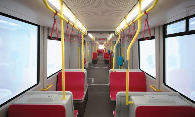 Das gar nicht so neue Innenleben der neuen Flexity-Garnituren: rote Sitze, gelbe Haltestangen, graue Böden und Wände. 