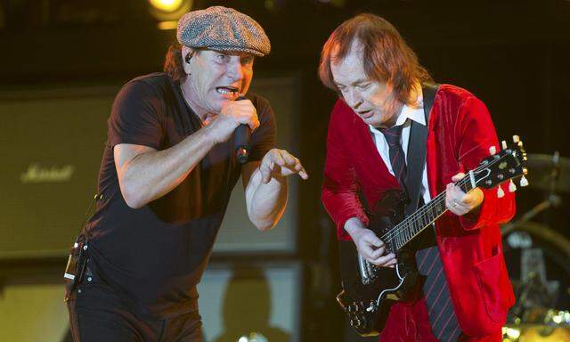 Brian Johnson and Angus Young of the Australian band AC/DC play at the Coachella Valley Music and Arts Festival in Indio