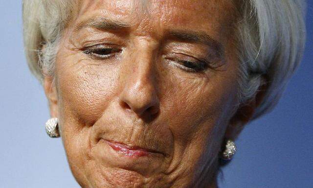 Lagarde pauses during remarks on state of world economy in Washington