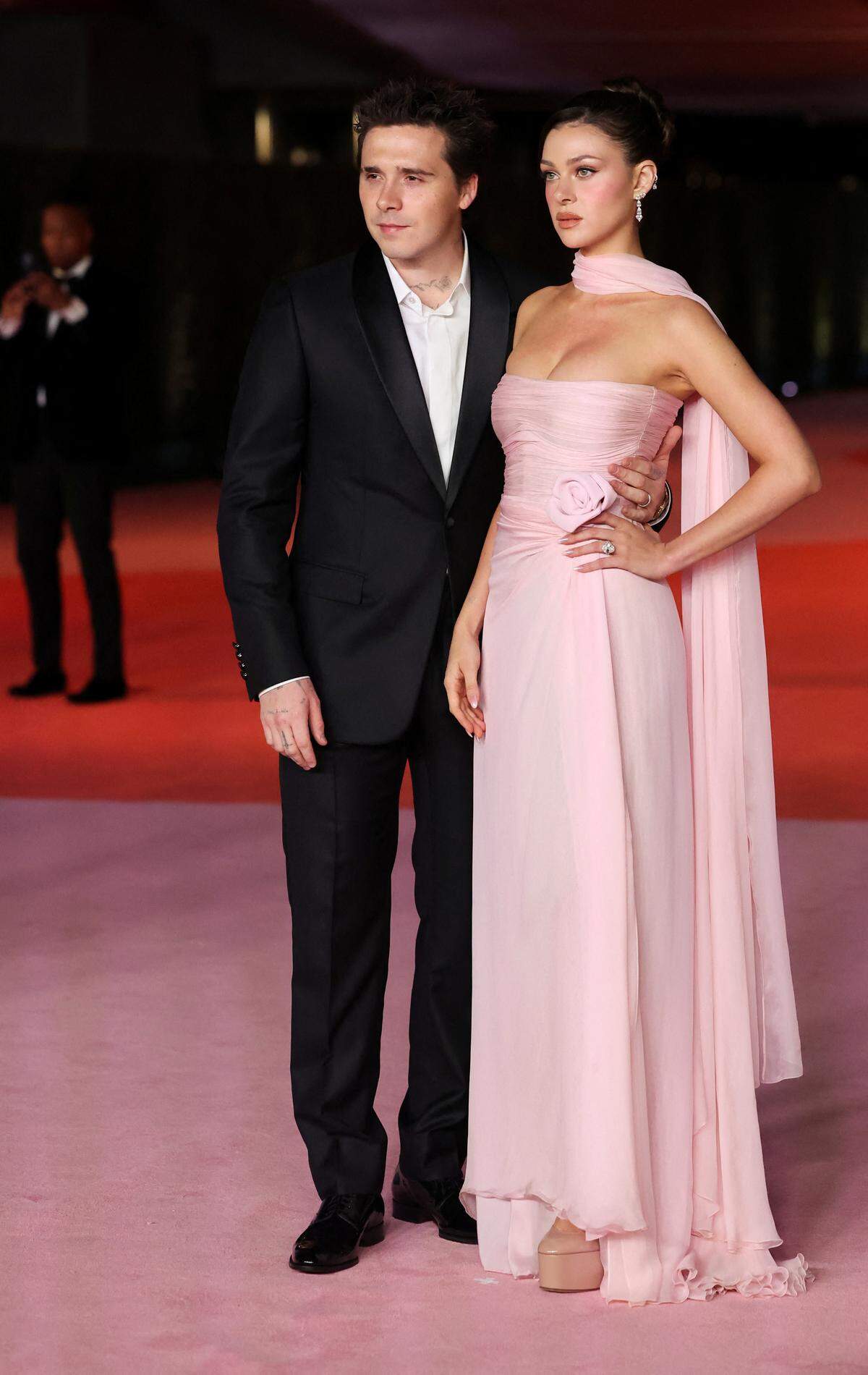 Nicola Peltz und Brooklyn Beckham (in Dior Men)