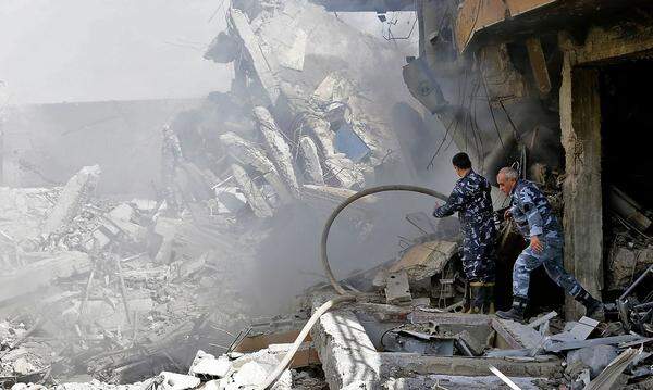 Der Tag nach den Angriffen: Bilder der syrischen Nachrichtenagentur SANA zeigen die zerstörte Zweigstelle der staatlichen Forschungseinrichtung SSRC.