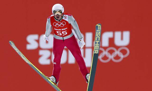 Germany´s Eric Frenzel soars through the air  during the training of the normal hill ski jumping portion of the Nordic Combined individual 10 km event at the Sochi 2014 Winter Olympic Games