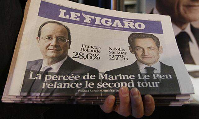 Hollande und Sarkozy buhlen bereits um die Stimmen der unterlegenen Kandidaten.