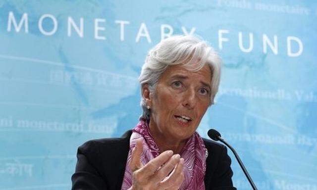 IMF managing director Christine Lagarde holds a news briefing at the International Monetary Fund head