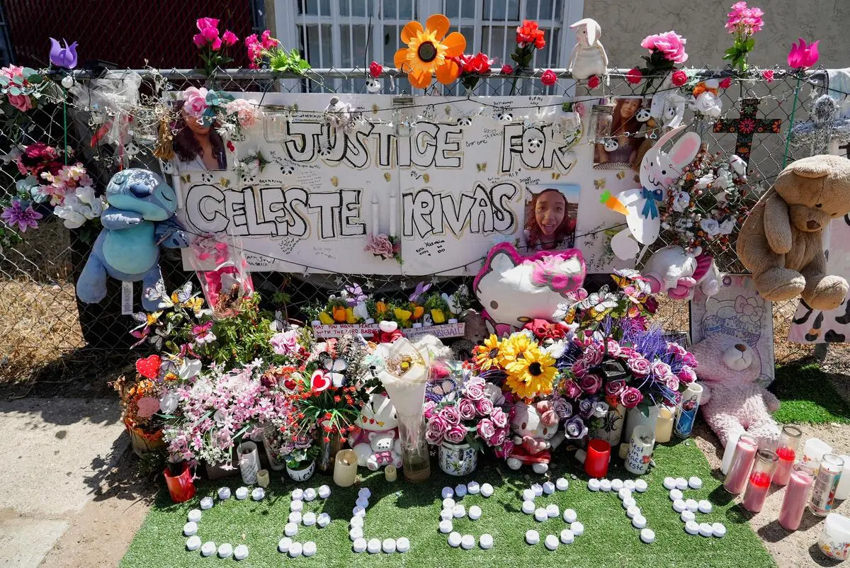 People remember the girl with flowers, candles and stuffed animals. 