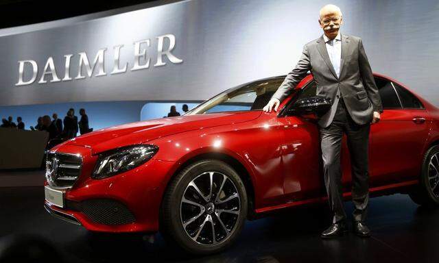 Daimler CEO Zetsche poses prior to Daimler annual shareholder meeting in Berlin