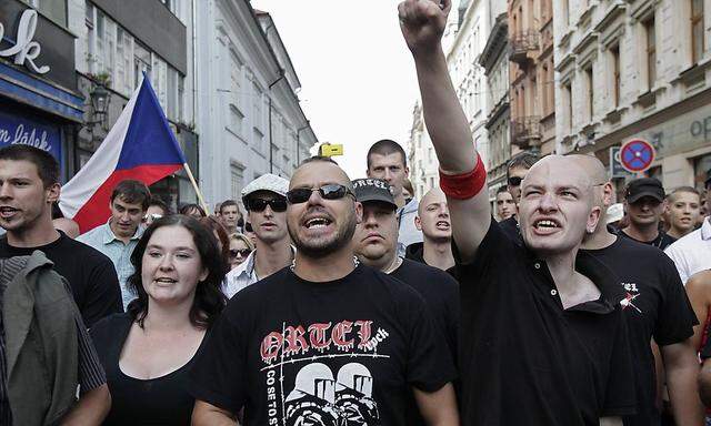 Far-right Czech activists shout as they march in protest against Roma minority in Plzen
