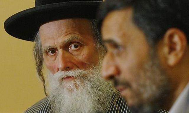 Irans President Ahmadinejad speaks as Rabbi Moshe Ber Beck of Neturei Karta, a fringe Ultra-Orthodoxs President Ahmadinejad speaks as Rabbi Moshe Ber Beck of Neturei Karta, a fringe Ultra-Orthodox