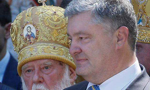 Wunsch nach mehr Eigenständigkeit. Patriarch Filaret und der ukrainische Präsident, Petro Poroschenko.