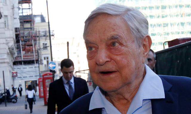 Business magnate George Soros arrives to speak at the Open Russia Club in London