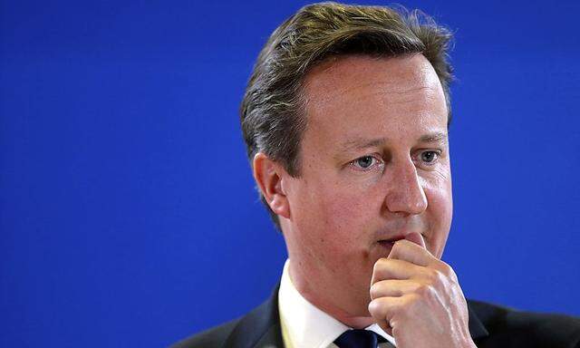 Britain´s PM Cameron holds a news conference during an European Union leaders summit in Brussels