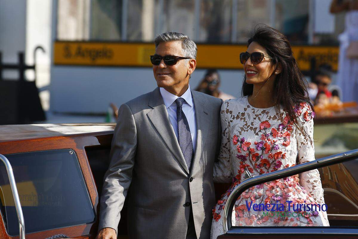 Clooneys "Big, Fat Italian Wedding", wie italienische Medien die prunkvolle Hochzeit bezeichneten, begeisterte tausende Touristen, die sich auf den Br&uuml;cken des Canal Grande versammelten.