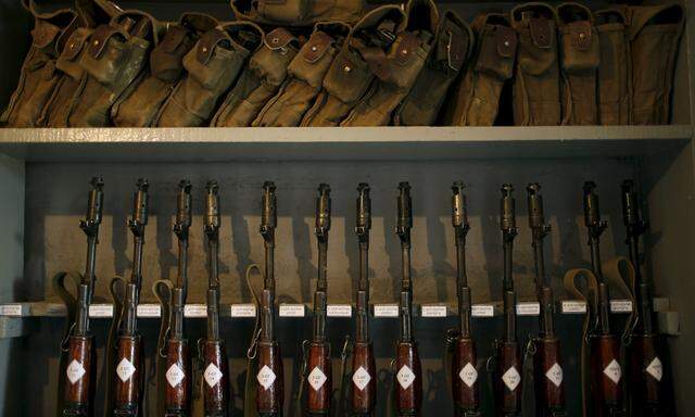 Kalashnikov rifles are seen in a trench at the Armenian positions near Nagorno-Karabakh´s town of Martuni