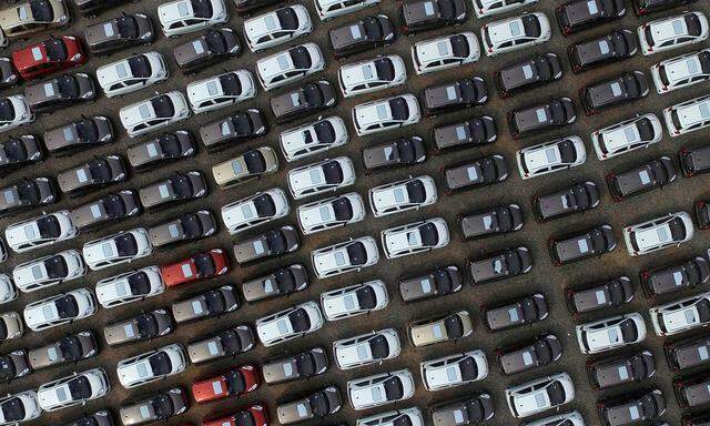 Electric cars are seen at a parking lot of an automobile factory in Xingtai, Hebei province, China 
