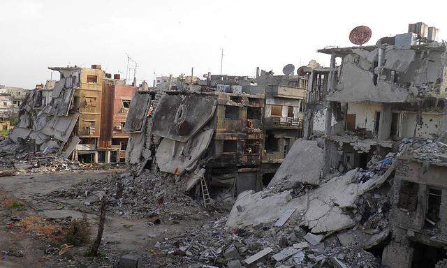 Zerstörte Häuser in Homs