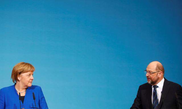 Kampf um eine Regierungsbildung. Die Partei von Martin Schulz, die SPD, soll Angela Merkel (CDU) nach 2005 und 2013 erneut zur Kanzlerin machen.    
