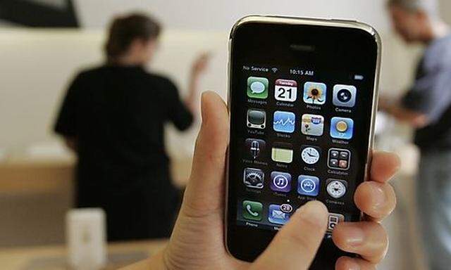 A customer displays an Apple iPhone 3GS at an Apple store in Palo Alto, Calif., Tuesday, July 21, 200