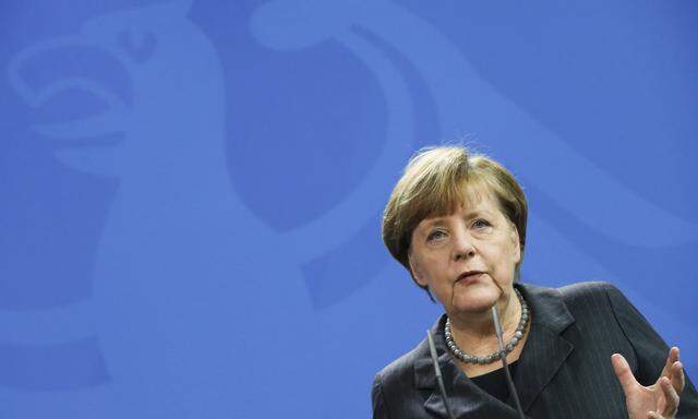 German Chancellor Merkel addresses a news conference at the Chancellery in Berlin