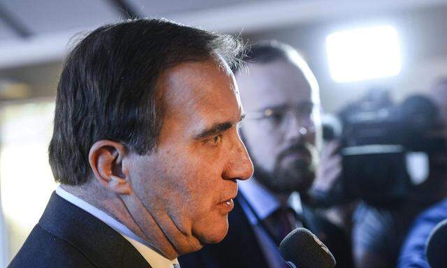 Prime Minister Stefan Lofven answers questions after a news conference at the Swedish Parliament in Stockholm