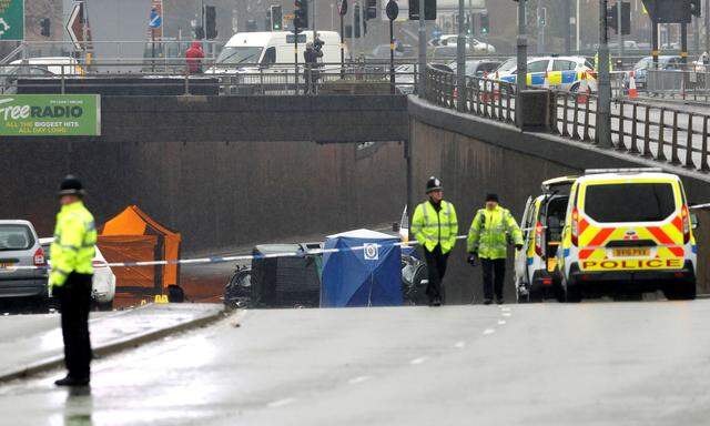 Police and emergency services are seen working at the scene of a multiple car crash on Lee Bank Middleway in central Birmingham