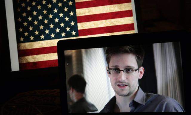 ITAR TASS MOSCOW RUSSIA JANUARY 23 2014 Former CIA agent Edward Snowden on screen gives onlin