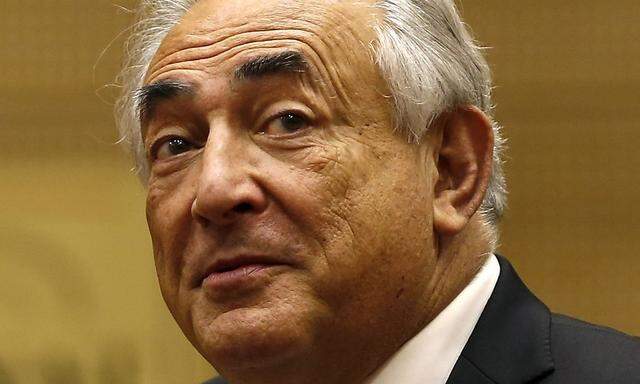 Former International Monetary Fund chief Strauss-Kahn arrives to attend a French Senate commission inquiry on the role of banks in tax evasion in Paris
