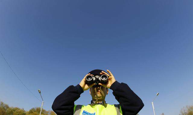 A Romanian officer participates in a Frontex border check exercise at Sculeni border point, between Romania and Moldova, 430 km northeast of Bucharest