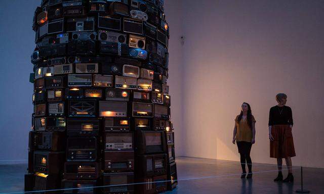 June 14 2016 London London London UK Two women take in Babel 2001 a tower of radios which