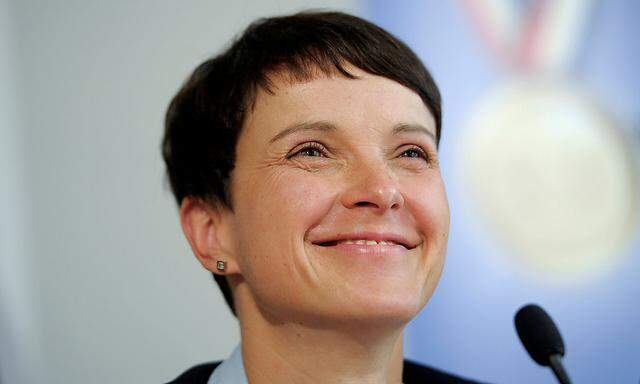 Frauke Petry, chairwoman of the anti-immigration party Alternative for Germany smiles at a news conference in Berlin
