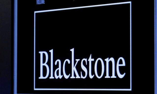 FILE PHOTO -  The logo of Blackstone Group is displayed at the post where it is traded on the floor of the New York Stock Exchange