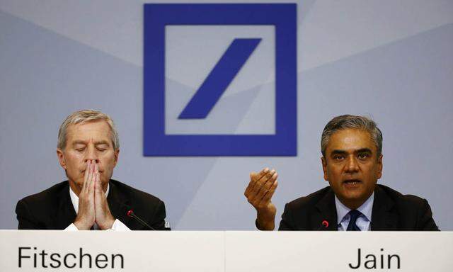 Jain and Fitschen, co-CEOs of Deutsche Bank, address a news conference in Frankfurt