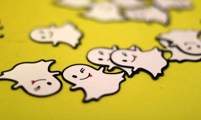 FILE PHOTO: The logo of messaging app Snapchat is seen at a booth at TechFair LA, a technology job fair, in Los Angeles