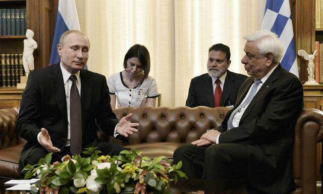 Greek President Pavlopoulos meets with Russian President Putin at the Presidential Palace in Athens