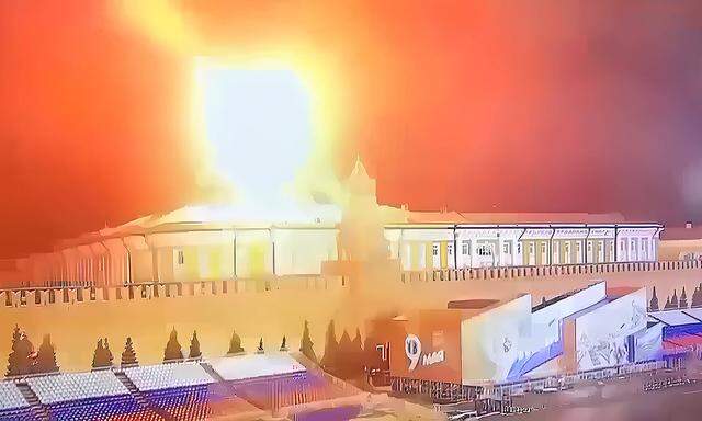 CCTV image shows flames and smoke above the dome of the Kremlin Senate building on April 3, 2023 in Moscow, Russia. Krem