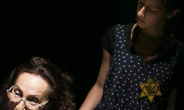 Israeli teenager, Talia and Holocaust survivor Toni Shabtay, perform during a dress rehearsal, part of an educational project, near Tel Aviv