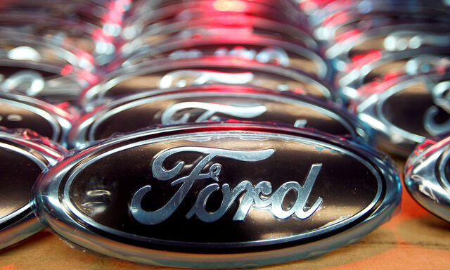 FILE PHOTO: Ford logos are seen at the assembly line of the Ford car factory of Saarlouis, Germany