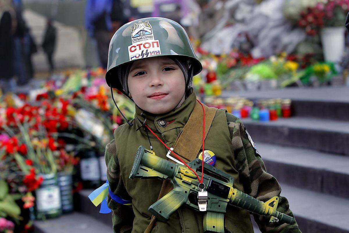 Noch ein Kind, anderer Schauplatz: Am Maidan-Platz in Kiew gingen am Tag des Referendums auf der Krim versammelten sich einmal mehr proukrainische Demonstranten.