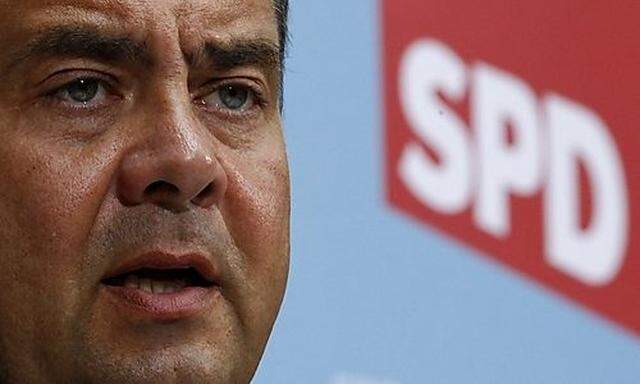 SPD party leader Gabriel addresses a news conference following a party leaders meeting in Berlin