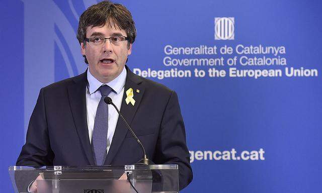 Former Catalan leader Carles Puigdemont holds a news conference in Brussels