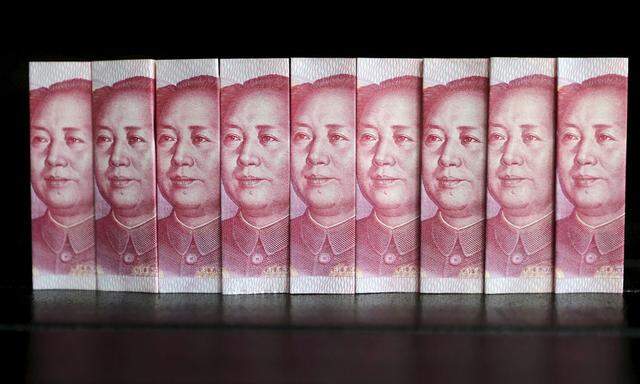 File picture illustration taken in Beijing shows Chinese 100 yuan banknotes