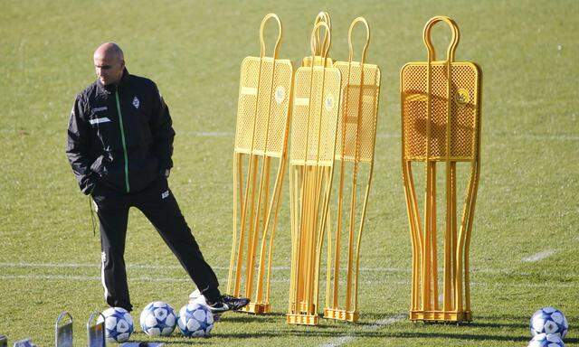 Borussia Moenchengladbach coach Schubert stands on the training pitch on the eve of their Champions League Group D soccer match against Juventus Turin in Moenchengladbach