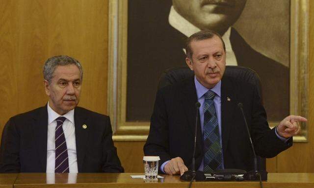 Turkey's Prime Minister Erdogan speaks during a news conference at Ataturk International Airport in Istanbul