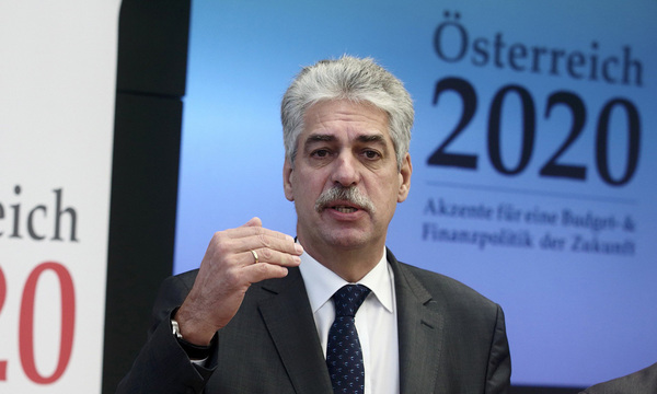 Austrian Finance Minister Schelling talks to the media at the start of an experts meeting to discuss budget policy in Vienna