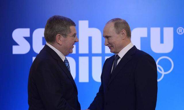 ITAR TASS SOCHI KRASNODAR TERRITORY FEBRUARY 4 2014 IOC chief Thomas Bach L and Russia s pres