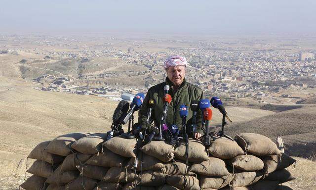 Iraqi Kurdish Regional President Massoud Barzani speaks during a news conference in the town of Sinjar, Iraq