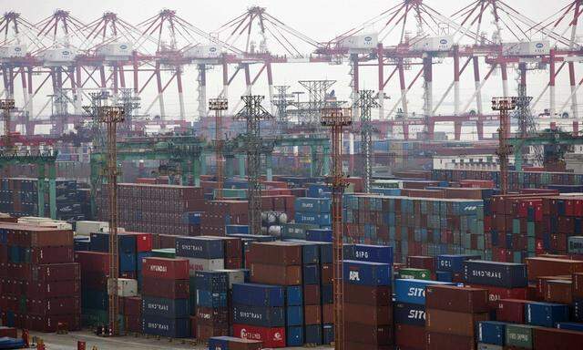 Containers are seen at a port of Shanghai Free Trade Zone